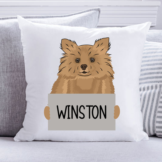 A square-shaped cushion with an illustration of a Pomeranian dog breed, with the text 'WINSTON' on a grey background.