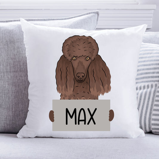 A personalised cushion with a poodle dog illustration in the centre, with the name 'Max' written on the cushion.