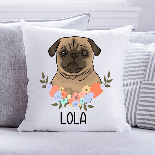 A square-shaped cushion featuring an illustration of a pug dog in the centre with a floral wreath around it, on a white background.