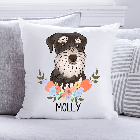 A square-shaped, white cushion with an illustration of a Schnauzer dog in the center surrounded by a floral pattern. The cushion has the text 'Molly' printed on it, indicating a personalisation option.