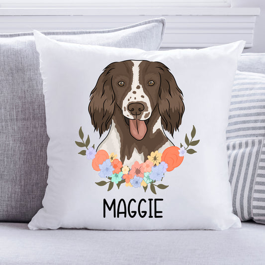 A square-shaped cushion with a white background featuring an illustration of a Springer Spaniel dog surrounded by a floral pattern.