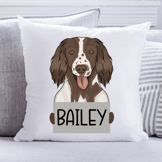 A personalised cushion featuring a printed Springer Spaniel dog with the name 'BAILEY' on a tag.