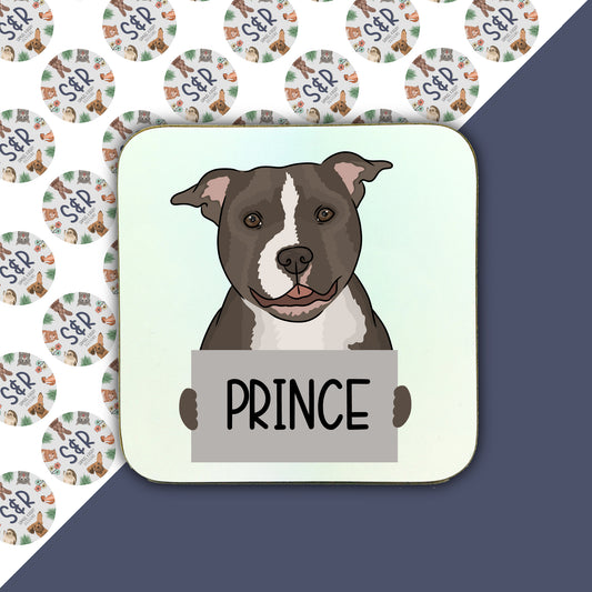 A square coaster with an illustration of a staffy dog and the name 'Prince' below it.