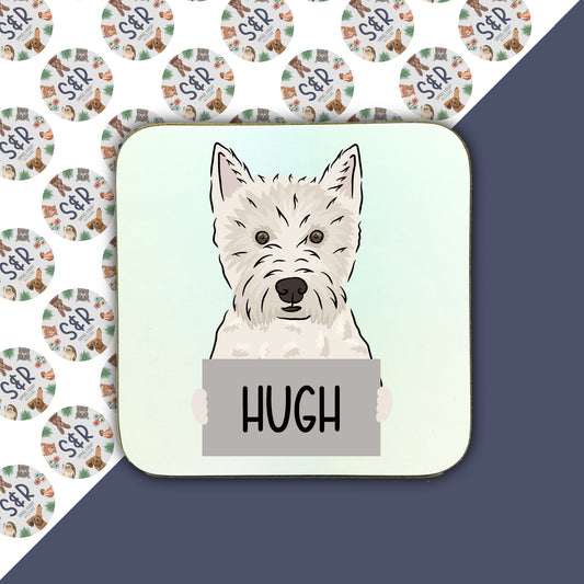 A square coaster with a personalised image of a Westie dog, with the name 'Hugh' printed on it, on a background of various Westie dog illustrations.